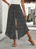 Pantalon palazzo noir à pois blancs pour femme – vue portée de face